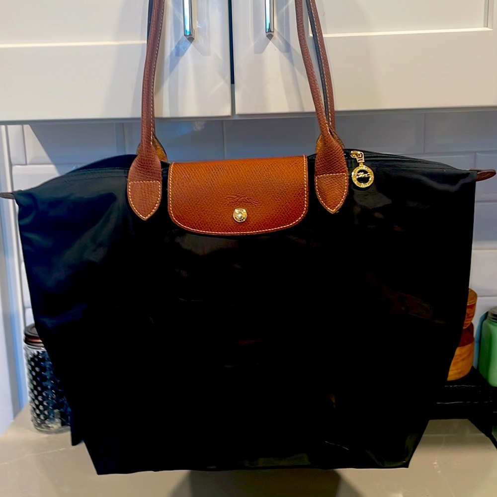 Longchamp la pliage bag. Black nylon and leather. rarely used. Great condition